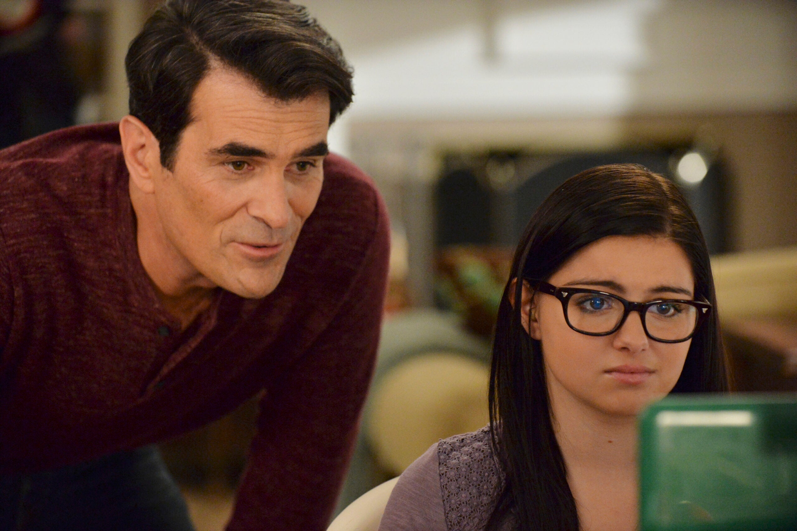 Phill Dunphy, played by Ty Burrell. and Alex Dunphy, played by Ariel Winter, in ABC's "Modern Family"
