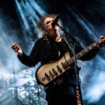 Robert Smith performs on stage during a concert a the Royal Arena in Oerestad in Copenhagen, on Oct.14, 2022.
