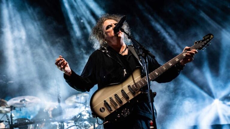 Robert Smith performs on stage during a concert a the Royal Arena in Oerestad in Copenhagen, on Oct.14, 2022.