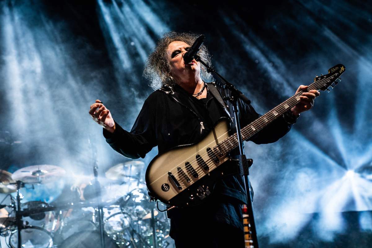 Robert Smith performs on stage during a concert a the Royal Arena in Oerestad in Copenhagen, on Oct.14, 2022.