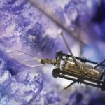 A robotic bee hovers over a purple background.