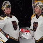 Boston Bruins goaltender Jeremy Swayman (1) and Boston Bruins goaltender Linus Ullmark (35) during warmups.