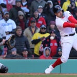 Adam Duvall swings and misses to end Boston's Opening Day loss.