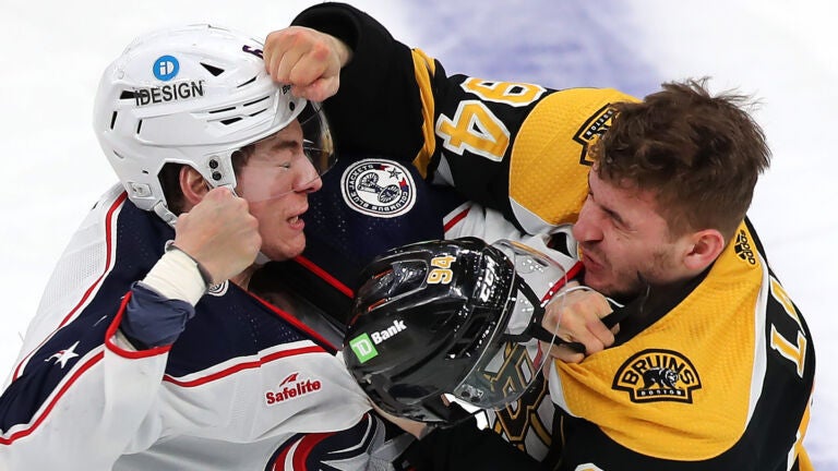 Columbus Billy Sweezey fights with Bruins Jakub Lauko in the 2nd period.