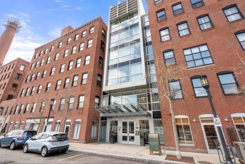 Image showcasing This Boston penthouse has a bedroom with a glass floor. Price: $2.49m.
