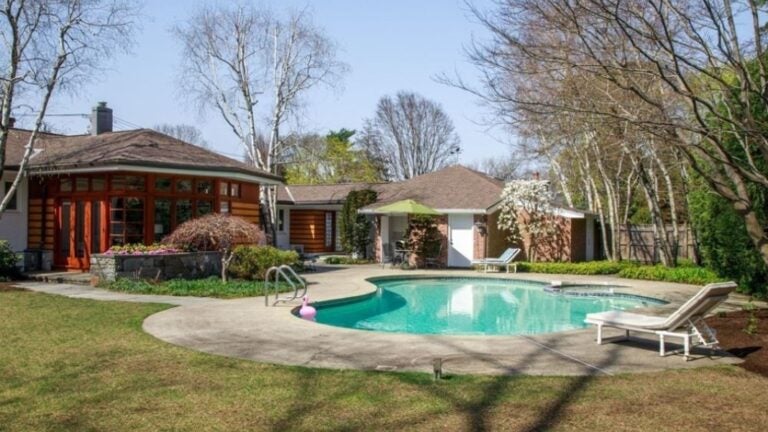A mid-century modern ranch with an in-ground pool.