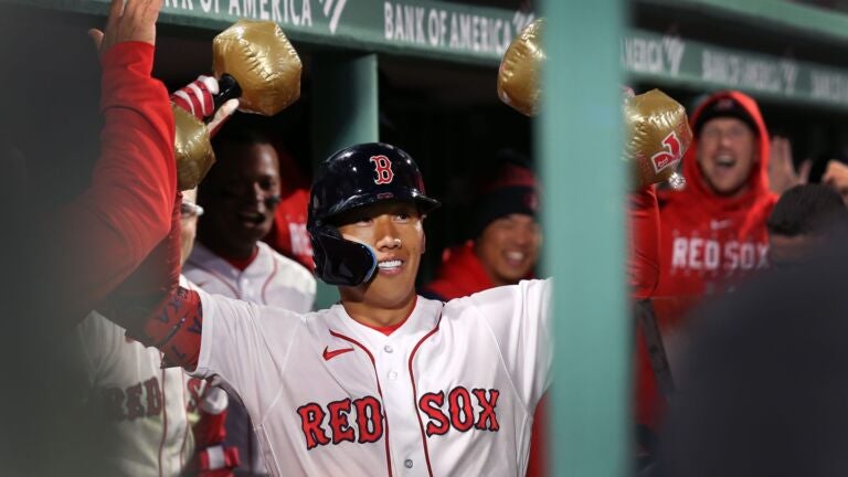 The Red Sox Masataka Yoshida is pumped (with inflatable barbells) in the dugout following the first MLB home run of his career in the first inning It was one of three home runs Boston hit in the inning. The Red Sox hosted the Pittsburgh Pirates in a regular season MLB interleague baseball game at Fenway Park.