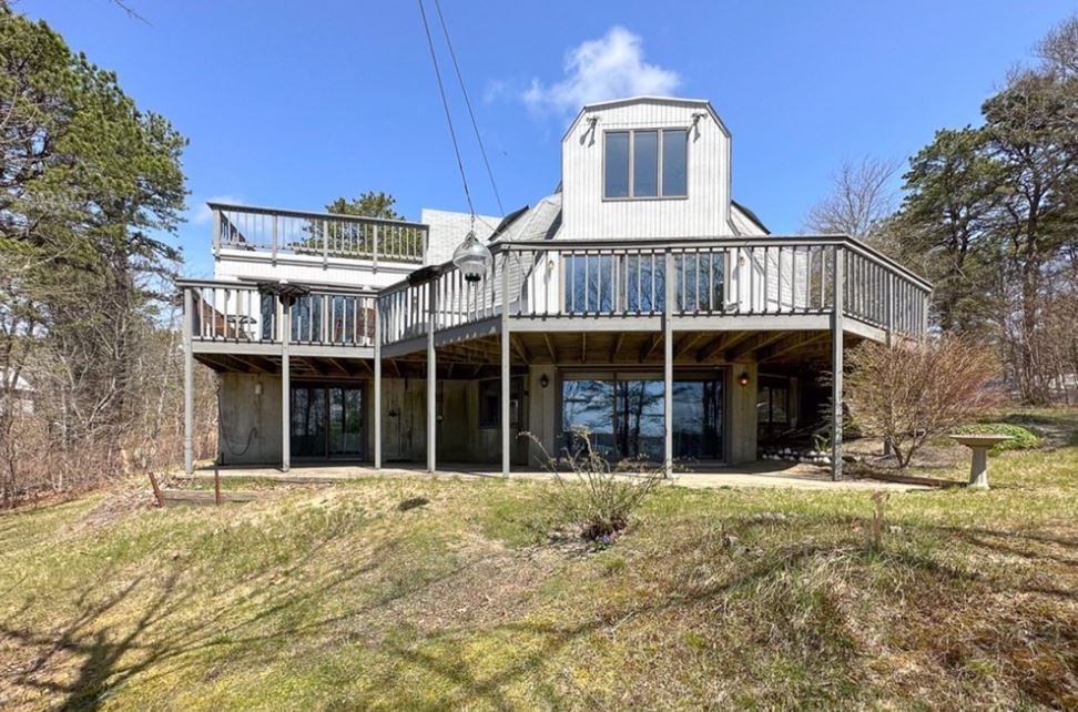 Even the garage on this Cape Cod home has a dome