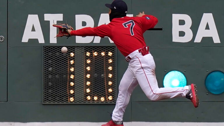 Red Sox Masataka Yoshida tries to get his glove on a double