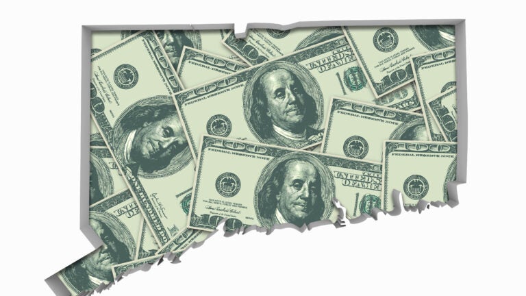 A outline of the state of Connecticut is filled with dollar bills to illustrate a story on property taxes.