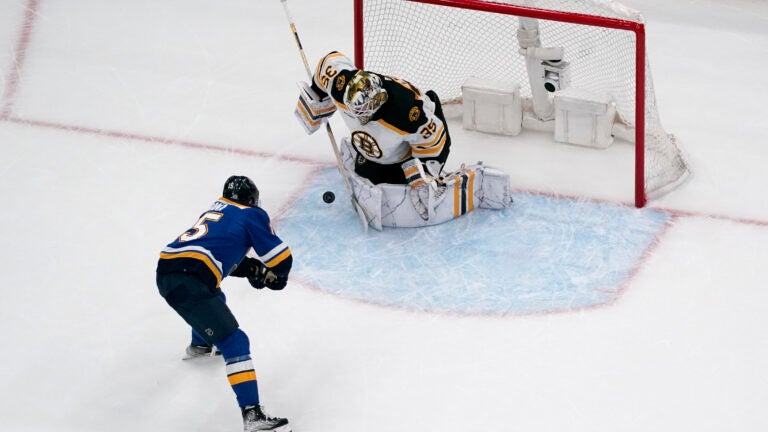 Bruins goaltender Linus Ullmark (35) stops a shot from St. Louis Blues' Jakub Vrana.