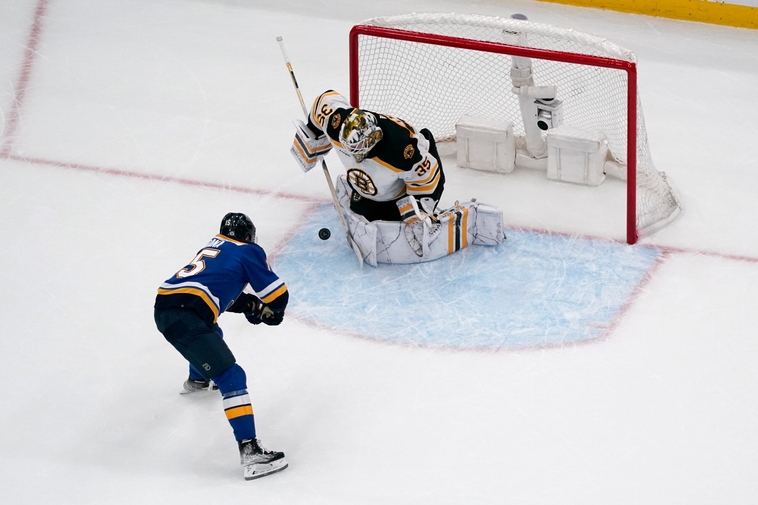 Bruins goaltender Linus Ullmark (35) stops a shot from St. Louis Blues' Jakub Vrana.
