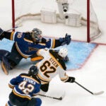 Bruins Oskar Steen scores past St. Louis Blues goaltender Jordan Binnington.