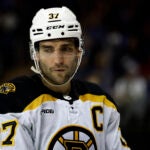 Boston Bruins center Patrice Bergeron (37) reacts against the New York Rangers in the second period of an NHL hockey game Thursday, Nov. 3, 2022, in New York.