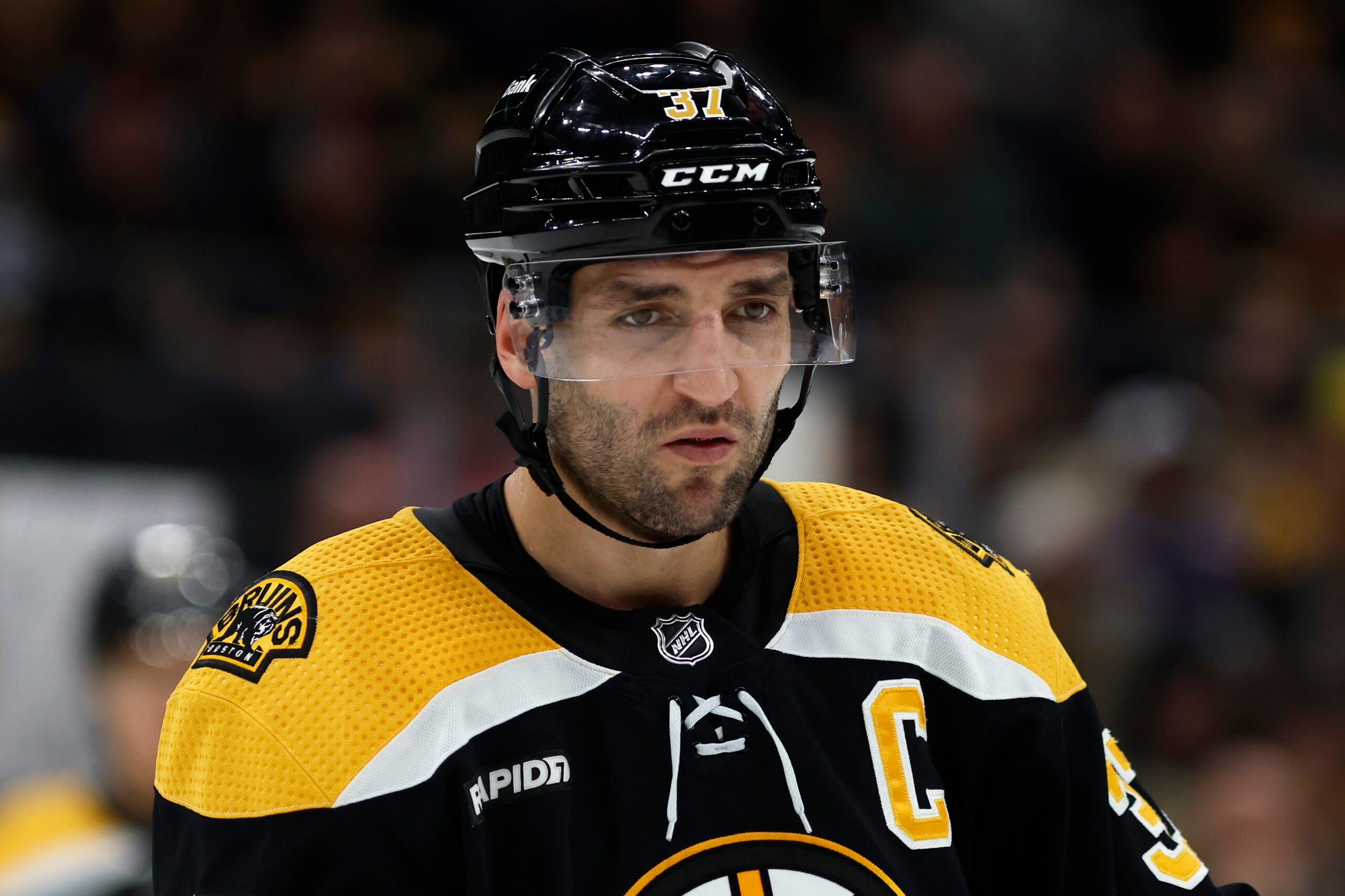 Boston Bruins' Patrice Bergeron during the third period of an NHL hockey game against the Vancouver Canucks Sunday, Nov. 13, 2022, in Boston.