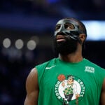 Jaylen Brown warms up before an NBA basketball game