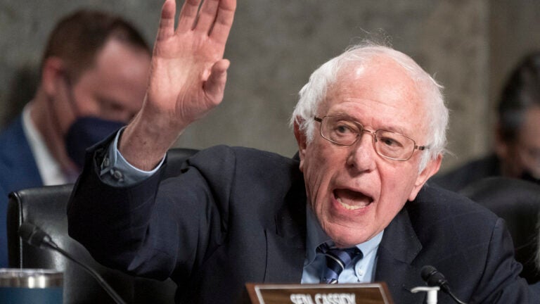 Senate Health, Education, Labor and Pensions Committee Chair Sen. Bernie Sanders, I-Vt., responds to another Senator's remarks during testimony by former Starbucks CEO Howard Schultz, Wednesday, March 29, 2023, on Capitol Hill in Washington.