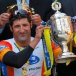 Ernst Van Dyk of South Africa holds the trophy after winning the men's wheelchair division at the 118th running of the Boston Marathon in Boston, Massachusetts April 21, 2014.
