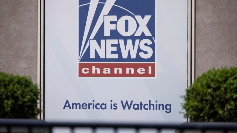 A logo of Fox News is displayed outside Fox News Headquarters in New York.