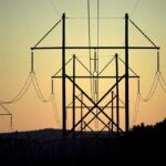 Central Maine Power utility lines are seen on Oct. 6, 2021, in Pownal, Maine.