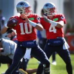 Patriots quarterbacks Mac Jones (left) and Bailey Zappe (right) are pictured at practice session on the field outside of Gillette Stadium.