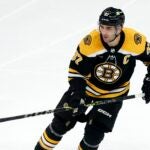 Boston Bruins' Patrice Bergeron plays against the Tampa Bay Lightning during the second period of an NHL hockey game, Saturday, March 25, 2023, in Boston.
