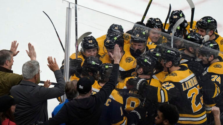 Bruins' leading-scorer David Pastrnak gives a gift to a frontline worker