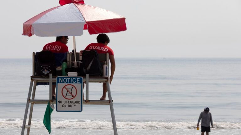 Lifeguards watch over Revere Beach, Saturday, Aug. 7, 2021.