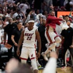 Heat guard Jimmy Butler celebrates the win over the Bucks in game 4.