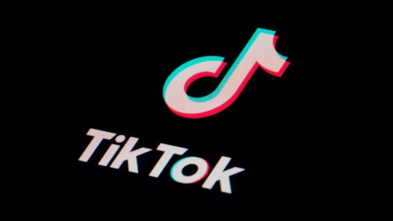 FILE - The icon for the video sharing TikTok app is seen on a smartphone.