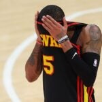 Dejounte Murray #5 of the Atlanta Hawks reacts against the Boston Celtics in the final seconds of the fourth quarter of Game Four of the Eastern Conference First Round Playoffs at State Farm Arena on April 23, 2023 in Atlanta, Georgia