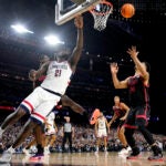 UConn forward Adama Sanogo working in the paint.