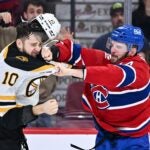 A.J. Greer of the Boston Bruins and Joel Armia of the Montreal Canadiens.