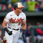 Baltimore Orioles' James McCann looks on as he flies out.
