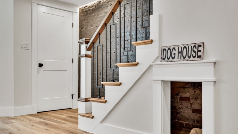 Dog home under store stairs