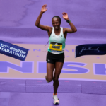 The B-Side. Hellen Obiri wins the 127th Boston Marathon with a purple-tinted background.