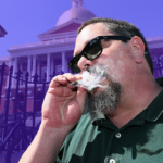 A man smoking a marijuana joint outside the Massachusetts State House. The background is tinted purple. The B-Side.