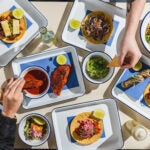 A table at Borrachito filled with food