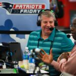 Dale Arnold (left) and Michael Holley (right) co-hosts of the Dale & Holley Show are pictured as they do their show on "Radio Row" in the Media Center at the Super Bowl.