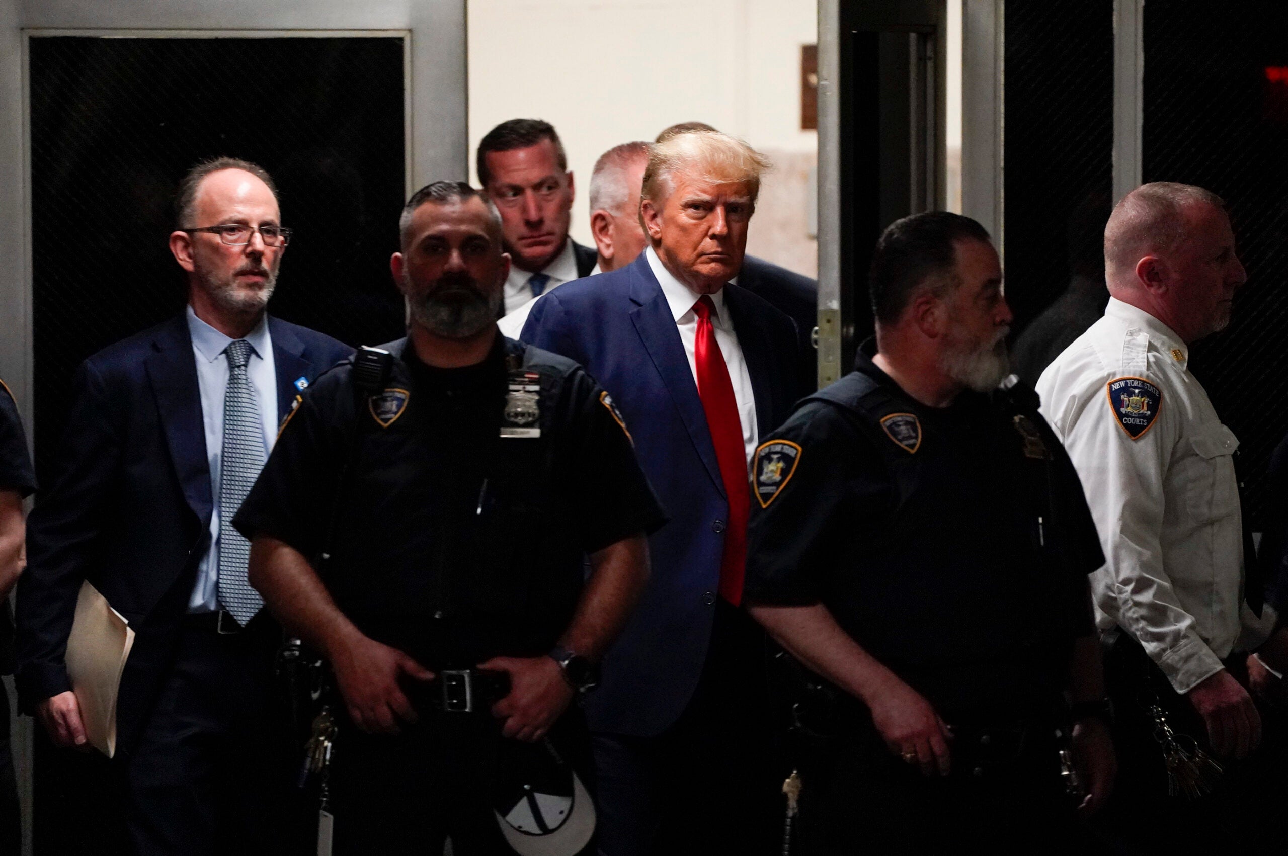 An appearance inside the courtroom at previous president Donald Trump's arraignment 6 https news service.s3.amazonaws.com trump faq 56e24290 d322 11ed 8667 8da77158c424 642c888ac621e scaled