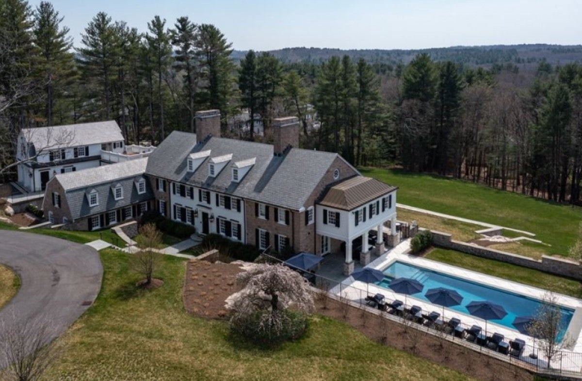 10,909-square-foot Needham mansion with outdoor swimming pool on 4.88-acre lot.