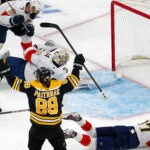 David Pastrnak (88) celebrates after drawing first blood with this goal during the first period.