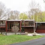 3 Barberry Road, a mid-century modern home with vertical lines and walls of glass.