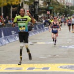 Rajesh Durbal crosses the finish line in the 125th Boston Marathon.