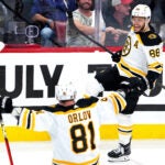 Boston Bruins right wing David Pastrnak (88) celebrates after his goal gave the Bruins a 3-0 lead in the third period. The Florida Panthers host the Boston Bruins in Game 3 of the Stanley Cup Playoffs on April 21, 2023 at FLA Live Arena in Sunrise, FL.