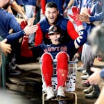 Jose Iglesias pushes Kiké Hernandez in the laundry cart following his solo home run in the fourth inning. Boston Red Sox at Houston Astros, Game 2 of the ALCS on Saturday, Oct. 16, 2021 at Minute Maid Park in Houston, Texas.
