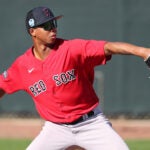 Red Sox pitcher Brayan Bello throws during Spring Trianing.