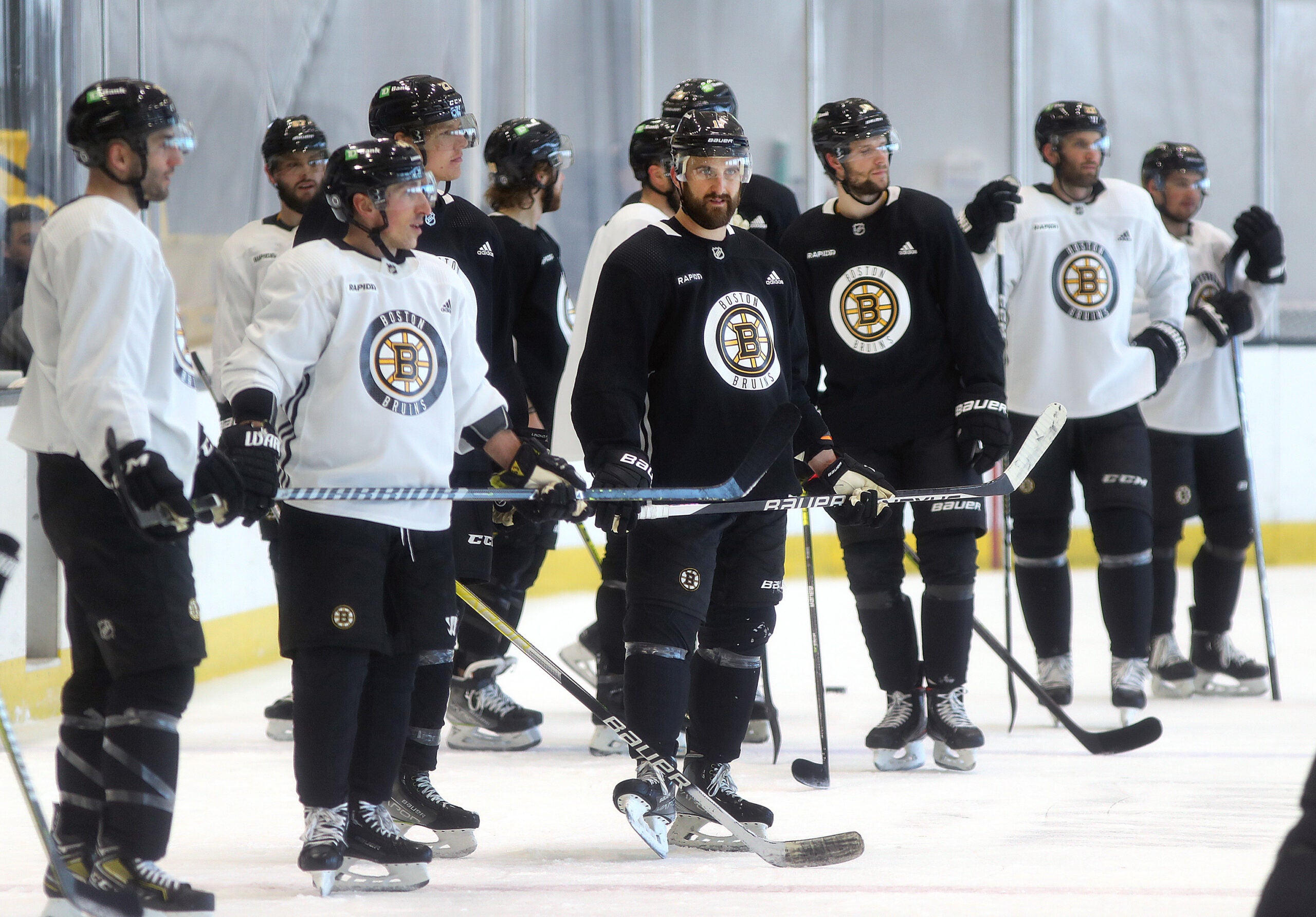 The Boston Bruins held practice at Warrior Ice Arena. Players watch a drill.