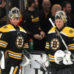 Boston Bruins vs Florida Panthers- Boston Bruins goaltender Jeremy Swayman (1)(left) and Boston Bruins goaltender Linus Ullmark (35) chat during pregame warmups.