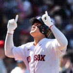 Red Sox infielder Yu Chang celebrates a home run.